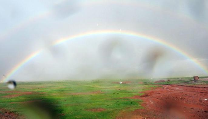 科考隊員在茲格塘錯采樣返程途中，高原風雨彩虹送行?！?lt;a target='_blank' ><p  align=