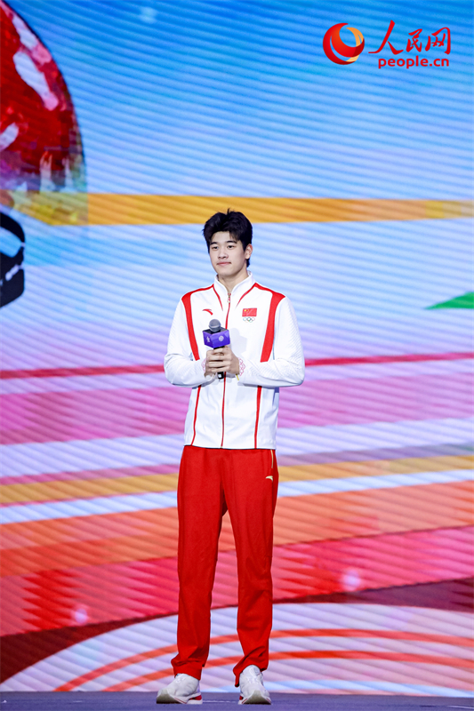 潘展樂分享自己的成長經歷。人民網記者 于凱攝