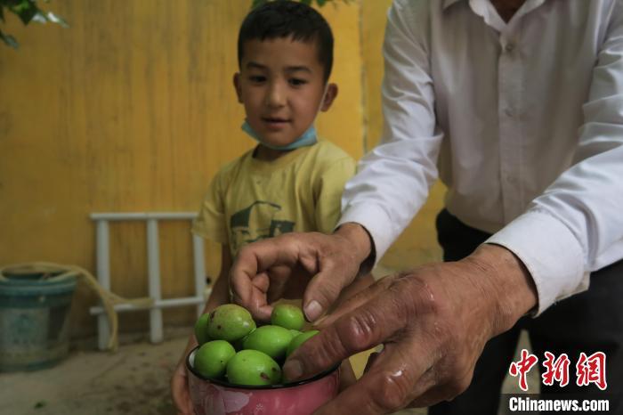 圖為進藏先遣英雄連誓師地原址所在的新疆維吾爾自治區(qū)和田地區(qū)于田縣普魯村現(xiàn)貌?！畛坛?攝