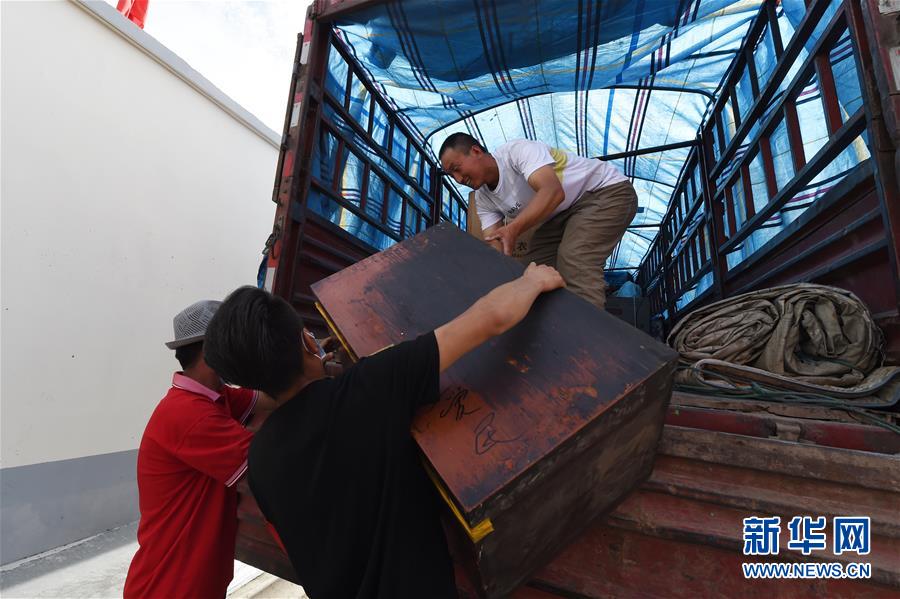 （新華全媒+）（26）千里“挪窩”，踏實開啟新生活