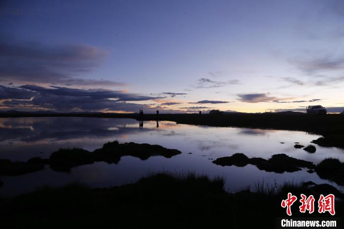 圖為夕陽下的查旦濕地?！●R銘言 攝